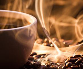 Showing coffee cup and beans